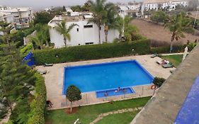 Bel Appartement à PUERTO MARINA-DAR BOUAZZA avec piscines et jardins